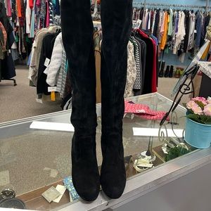 Valentino Garavani black knee high suede boots.